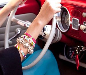 girl driving with bracelets - kate spade car.jpg